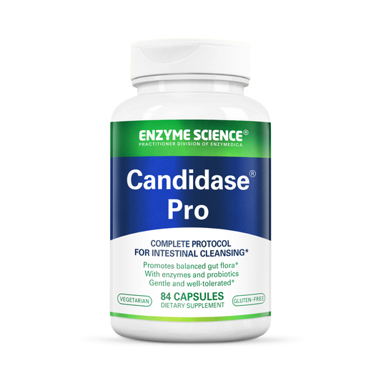 A bottle of Candidase Pro dietary supplement with 84 capsules, marketed for intestinal cleansing and promoting balanced gut flora.
