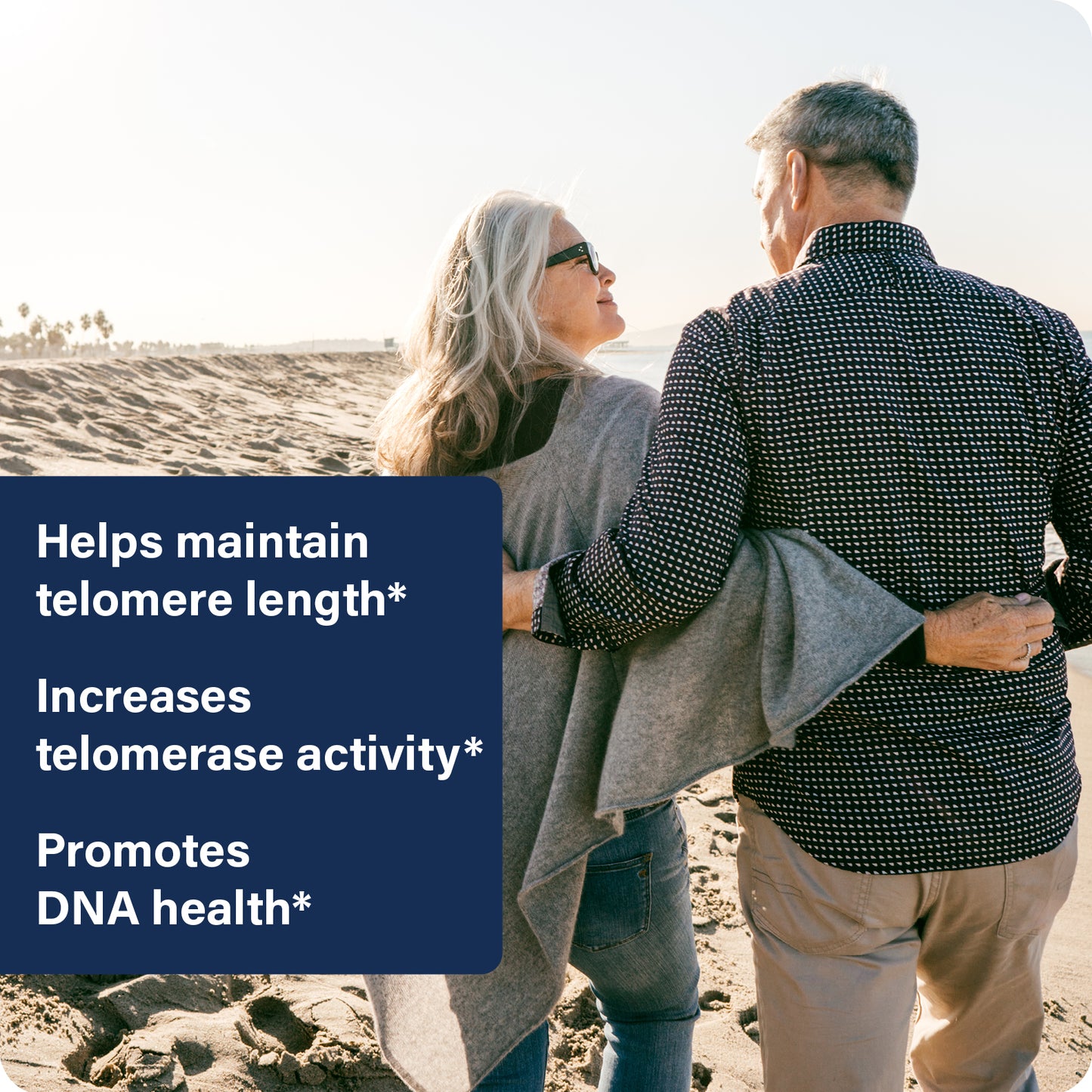 Two people walking on a beach with text about telomere health.