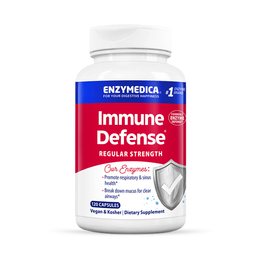 A bottle of Enzymedica Immune Defense Regular Strength dietary supplement with 120 capsules, predominantly white and blue in color, with additional branding and product information.