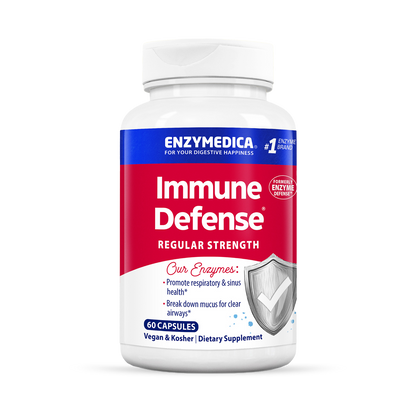 A bottle of Enzymedica Immune Defense Regular Strength dietary supplement with 120 capsules, predominantly white and blue in color, with additional branding and product information.