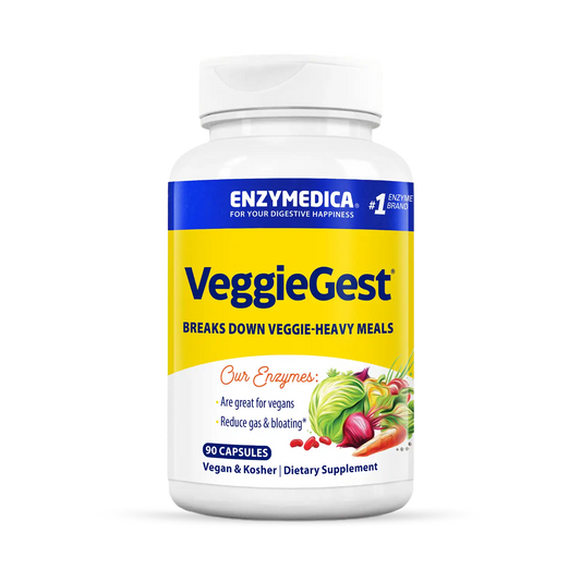 A bottle of VeggieGest dietary supplement by Enzymedica, with a label showing various fruits and vegetables indicating its use for breaking down vegetable-heavy meals.
